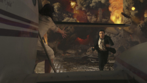 Jackson Curtis runs from the erupting volcano. 2012.