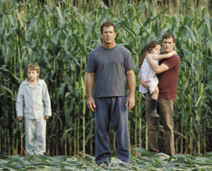 The Hess family struggle with the alien invasion. Signs.