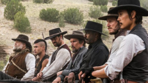 The Magnificent Seven heroes stand and fight together