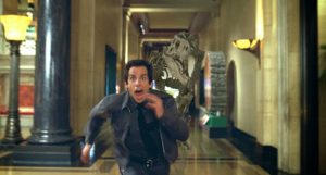 Larry runs from the T-Rex. Night at the Museum