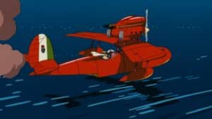 Porco flies his famous red plane. Porco Rosso