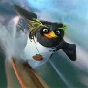 Cody Maverick surfs a big wave. Surf's Up.