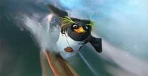 Cody Maverick surfs a big wave. Surf's Up.