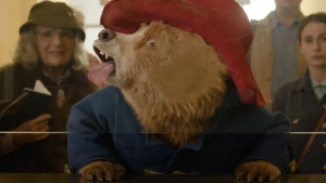 Paddington copies his passport photo. Paddington In Peru